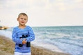 The little boy in the vest with binoculars Royalty Free Stock Photo
