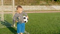 Little boy waiting to play soccer Royalty Free Stock Photo