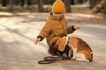 Little boy walk dog Royalty Free Stock Photo