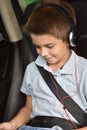 Little boy watching movie on tablet in the car Royalty Free Stock Photo