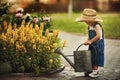 Little boy watering flowers