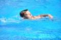 Little boy and watersports. Active holiday in the pool. swim practice Royalty Free Stock Photo