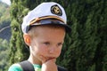 A little boy wearing a cap captain Royalty Free Stock Photo