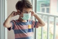 A boy wearing face mask to protect virus Royalty Free Stock Photo