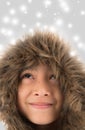 Little boy wearing fur coat protect from cold snow over head Royalty Free Stock Photo