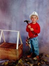 Little Boy Wearing Hard Hat Royalty Free Stock Photo