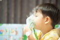 Little boy wearing oxygen mask in hospital ward Royalty Free Stock Photo