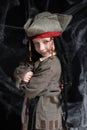 Little boy wearing pirate costume