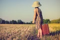 Little boy wearing plaid romper and pith helmet Royalty Free Stock Photo