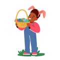 Little Boy Wearing Rabbit Ears Holding Basket Full Of Colorful Easter Eggs. Joy And Innocence Of Childhood Concept