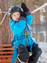 Little boy mountaineering in winter