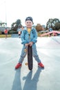 Little boy 3-5 years old, summer on sports field in city, autumn outdoors, happy smiling, having fun playing joyful Royalty Free Stock Photo