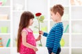 Little boyfriend giving flower