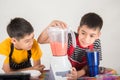 Little boys blend water melone juice by using blender home