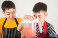 Little boys blend water melone juice by using blender home