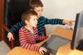 Little boys learning at computer Royalty Free Stock Photo