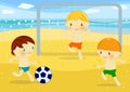 Little boys playing football on the beach Royalty Free Stock Photo