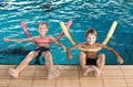 Little boys with swimming noodles Royalty Free Stock Photo