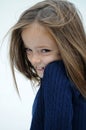 Cheekily schoolgirl with long hair and freckles Royalty Free Stock Photo