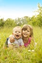 Little brother and sister playing on the nature Royalty Free Stock Photo