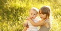 Little brother and sister playing on the nature Royalty Free Stock Photo