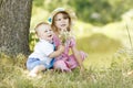 Little brother and sister playing on the nature Royalty Free Stock Photo