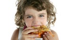 Little brunette girl eating pizza Royalty Free Stock Photo