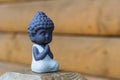 Little Buddha statue image used as amulets of Buddhism religion. Meditation concept with empty space for text Royalty Free Stock Photo