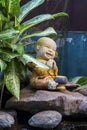 Little Buddhist monk sculpture Royalty Free Stock Photo