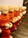 Little buddhist monk statues in Alibaug, India Royalty Free Stock Photo