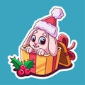 Little bunny in gift box. Christmas vector illustration. Christmas sticker. Rabbit in christmas hat