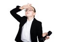 Little business woman talking on a phone, screaming into the phone. Studio portrait of child girl in business style Royalty Free Stock Photo