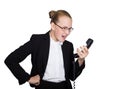 Little business woman talking on a phone, screaming into the phone. Studio portrait of child girl in business style Royalty Free Stock Photo