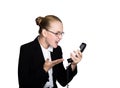 Little business woman talking on a phone, screaming into the phone. Studio portrait of child girl in business style Royalty Free Stock Photo