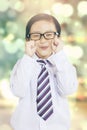 Little businessman with bokeh background Royalty Free Stock Photo