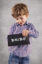 Little businessman with a envelope, concept of bribing