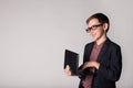 Little businessman holding laptop in his hands Royalty Free Stock Photo