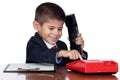 Little businessman marking a red phone Royalty Free Stock Photo