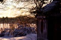 Little cabin facing the frozen lake Royalty Free Stock Photo