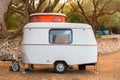 Little caravan with orange open roof