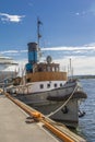 Little cargo boat docked in pier Royalty Free Stock Photo