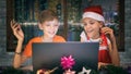 Little carol singers kids on video call with family celebrating Christmas during virtual party