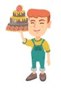 Little caucasian boy holding a chocolate cake. Royalty Free Stock Photo