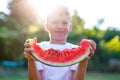 Little caucasian boy holding slice of watermelon Royalty Free Stock Photo