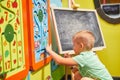 Little caucasian boy playing educational games one Royalty Free Stock Photo