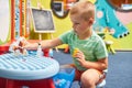 Little caucasian boy playing educational games one Royalty Free Stock Photo