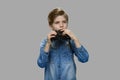 Little caucasian boy using binoculars. Royalty Free Stock Photo