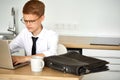 Little caucasian boy work on laptop at home Royalty Free Stock Photo