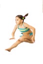 Little caucasian female 8 years old girl in multicoloured swimmwear jumping on white background. Royalty Free Stock Photo