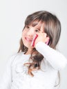 Little caucasian girl with cell phone Royalty Free Stock Photo